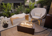 Brasero de Gas Moderno para Exterior: Elegancia y Calor con Planika — en jardín, por la mañana