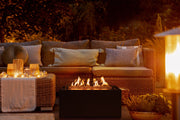 Brasero de Gas Moderno para Exterior: Elegancia y Calor con Planika — en terraza, de noche